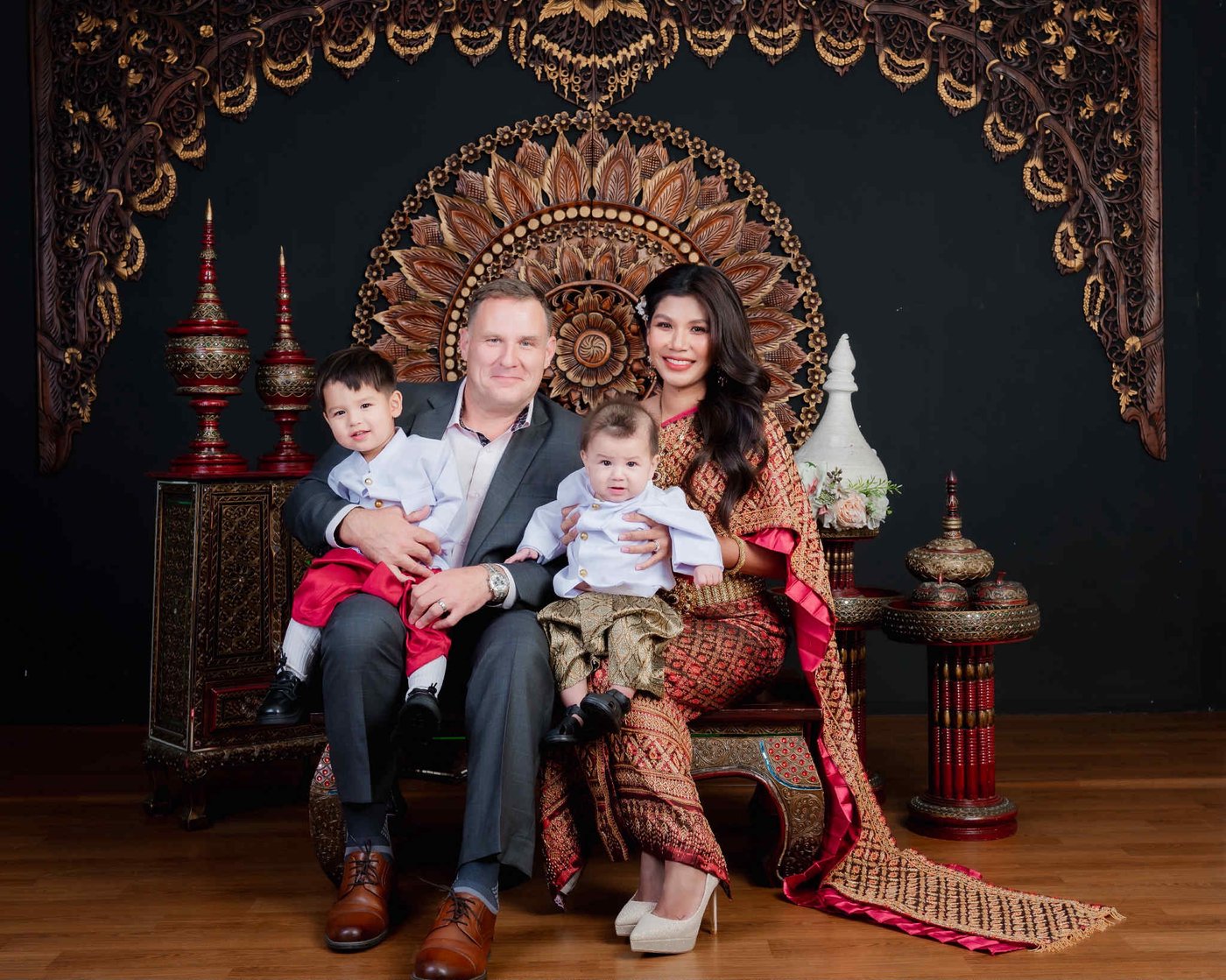 The Cunningham family in traditional Thai dress